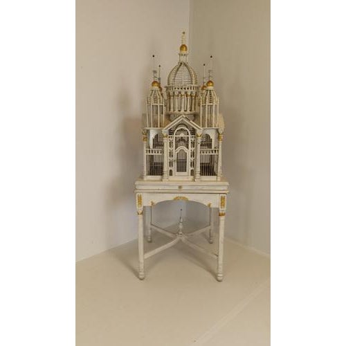 Introducing our exquisite Midcentury French Victorian Birdcage, a timeless piece that combines elegance and craftsmanship....