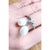 14 Karat White Gold Pearl and Diamond Free Form Ring 0.06 total diamond weight. 2 piece 9.5 mm pearls Size 7 2.04 grams...