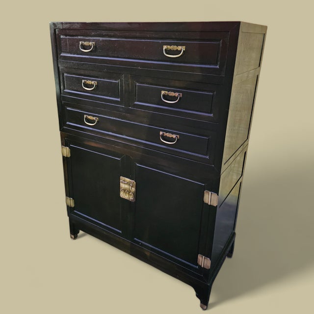 Michael Taylor's "Far East Collection" for Baker Furniture, Stackable and Interchangeable Chests on a Stand, is an...