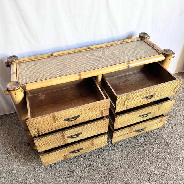 This vintage Boho Chic dresser showcases the timeless charm of natural bamboo craftsmanship. Its bold, chunky frame is...
