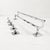 Set of hangers (4 single, 1 long), from Germany in the 1980s. They are beautifully crafted and feature a simple design....