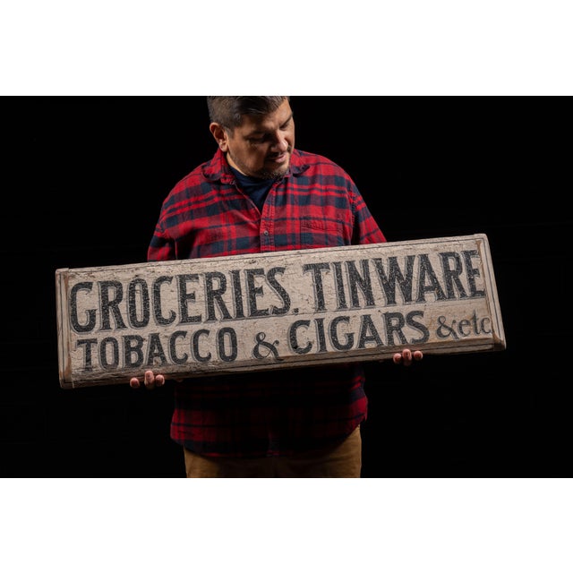 Reclaimed wood sign with tin endcaps. This piece is comprised of (likely) hickory was also likely reclaimed from an unused...