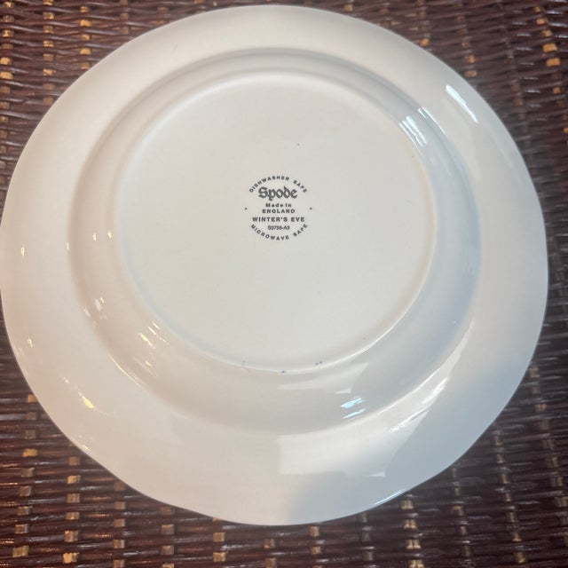 This is a Spode Winter's Eve Red (Camilla) salad/dessert plate featuring an intricate cranberry-red and white transferware...