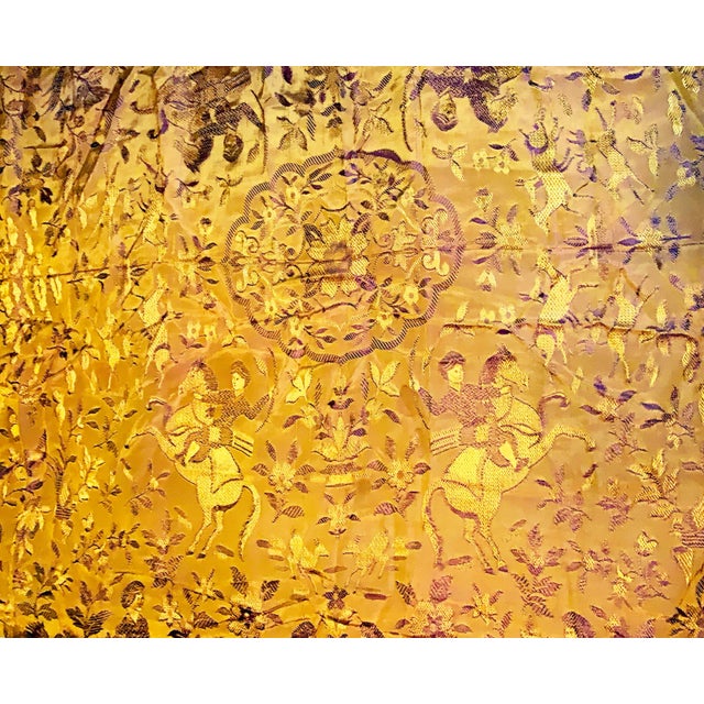 Add a unique, bohemian touch to any room with this vibrant, two-toned purple and gold silky brocade textile art. It was...