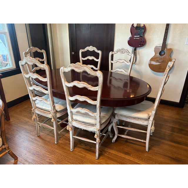 Fabulous set (6) French dining chairs. Ladder-back design provides style and strength. Six chairs provide seating for a...