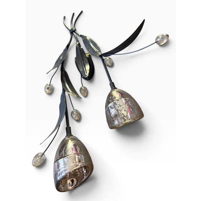 A striking vintage botanical wall sculpture featuring sculptural metal stems and leaves accented by two dimensional glass...