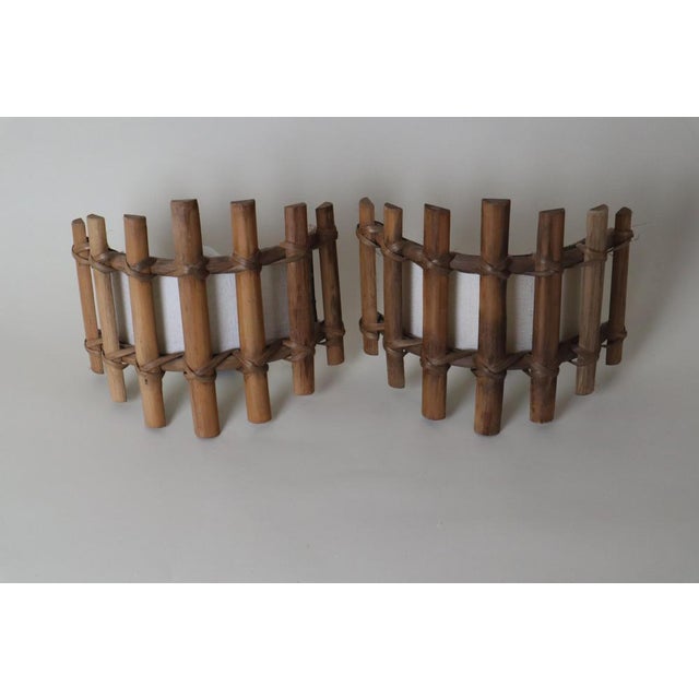 This lovely pair of wall lights was lovingly crafted in the 1960s, and its simple design never fails to impress. The lamps...