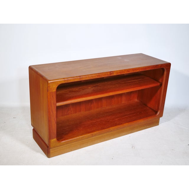 Open sideboard/shelf by Dyrlund, Denmark, 1960s. Danish design shelving unit made of teak with softly rounded edges and a...