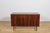 A small sideboard made of rosewood made in the 1960s in Denmark. Sideboard opened with a two sliding doors.The sideboard...