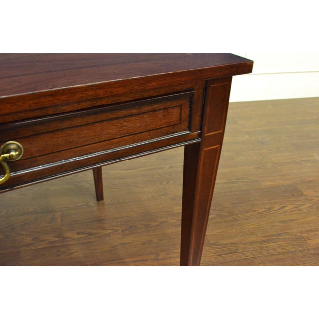 This is made-to-order traditional mahogany writing desk made in the Leighton Hall shop in Suwanee, Georgia. It features a...