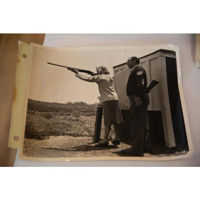 :: Incredible and rare photograph of Carole Lombard at skeet shooting range. From Russell Birdwell, Selznick International...
