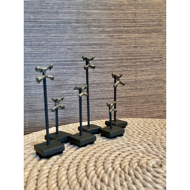 A set of six Rare 17th-18th century copper crosses from central Africa. In the same form as their larger counterparts that...