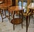 Elegant and richly detailed, this French Louis XV-style accent table showcases exceptional decorative woodworking and...