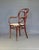 Very good original condition under original mahogany brown chelack. Recent 6-strand hand caning. This piece has an...