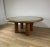 Large table with a wooden frame covered in leather and a glass top, Safari model designed by Redwall and produced in...