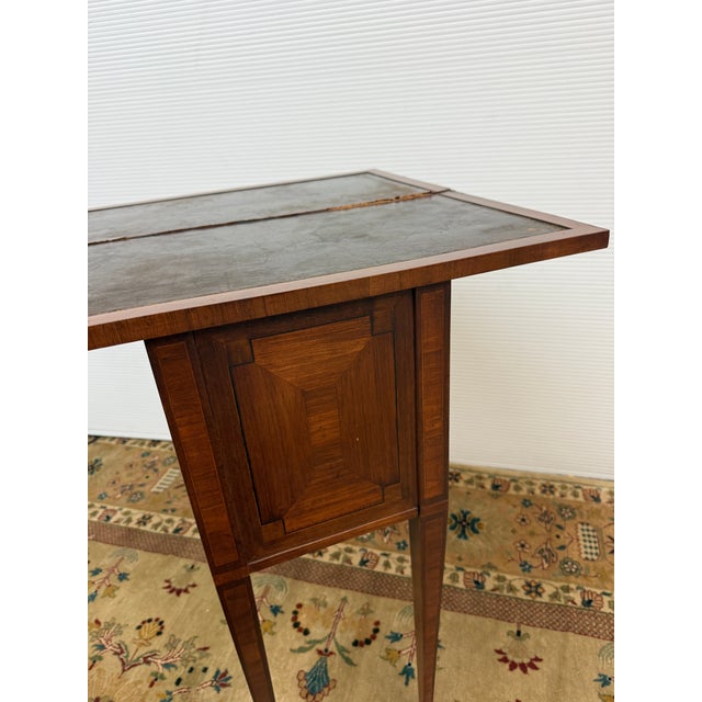 Design Plus Gallery presents a Faux Book Side Table from the Early 20th Century. The table is crafted in the neoclassical...