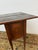 Design Plus Gallery presents a Faux Book Side Table from the Early 20th Century. The table is crafted in the neoclassical...