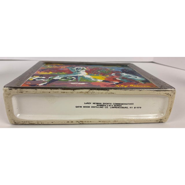 Beautiful porcelain decorative decanter by Leroy Neiman, Circa 1979. This liquor decanter with its baseball memorabilia,...