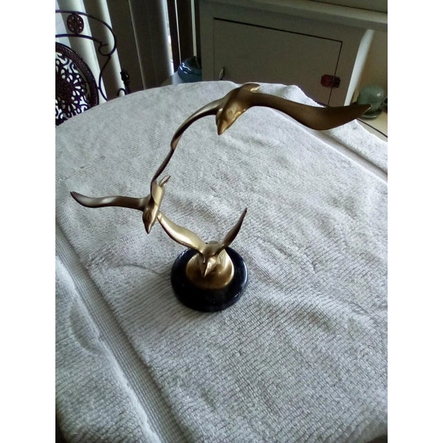 Brass, 3 Birds in Flight Sculpture on a Marble Base from the 1960's. Unsigned, in Curtis Jere (a home for a group of...