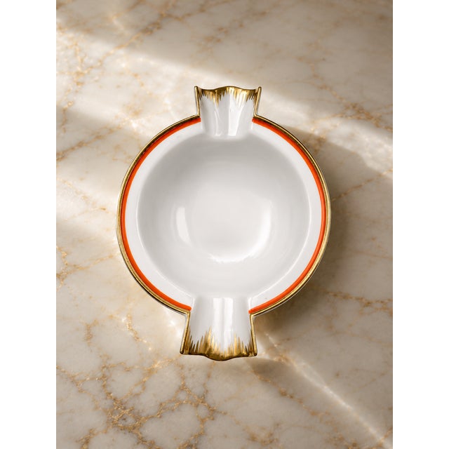 An elegant cigar ashtray in fine meissen porcelain, dating back to the art deco period (1930s-1940s). The object stands...