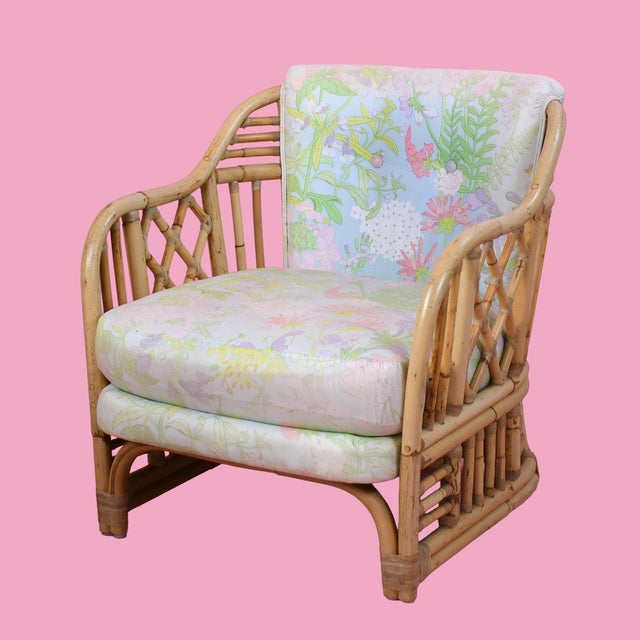 Transport yourself to a glamorous tropical retreat with this fabulous pair of vintage fretwork burnt bamboo club chairs....