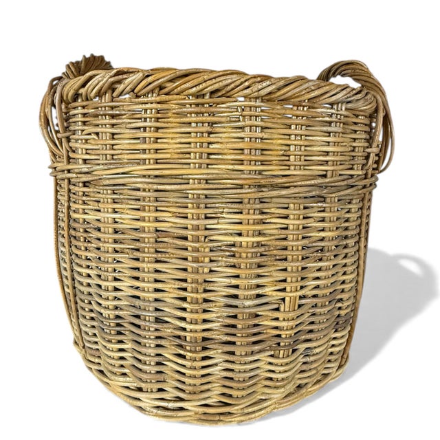 A pair of extra-large woven wicker baskets with double handles. Stylish and practical for a variety of storage options,...