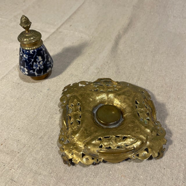 A fine late 19th Century English embossed brass inkwell encrier in the Renaissance Revival style, Victorian Period, with...