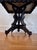 A beautiful Victorian Era table with a beveled Carrara marble top and a lovely black and gold painted wood base. Perfect...