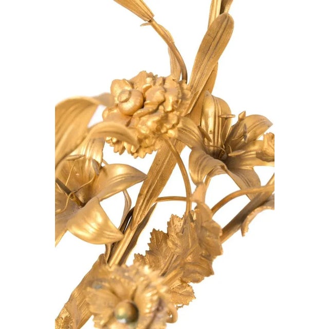 Magnificent pair of 19th Century French Candelabra 81x52 cm approx. in blue porcelain with gilded bronze ramage. good...