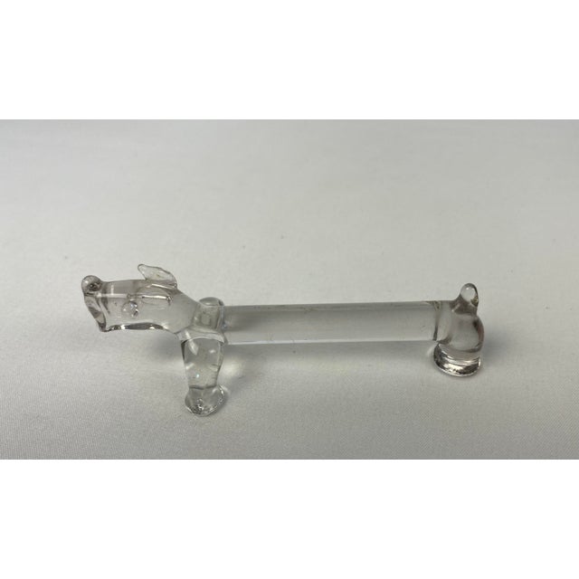 A charming set of 10 knife molded glass knife rests in the shape of a Basset Hound dog. Manufactured in France, circa...