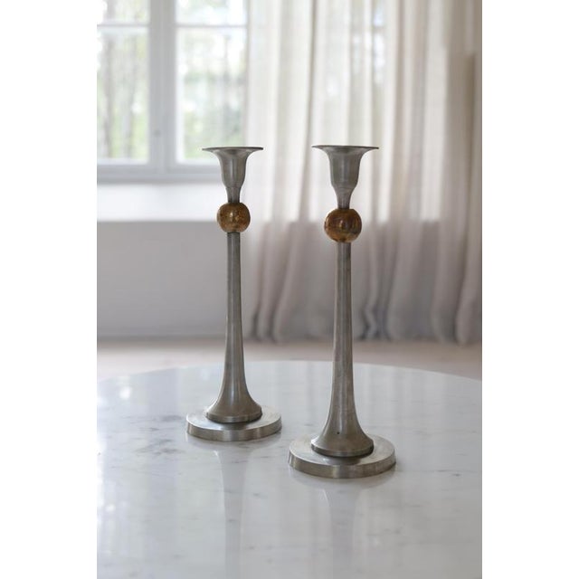 Art Deco candle holders made in pewter and brass made in Sweden during the 1930s. These ones wonderfully sculptured and...