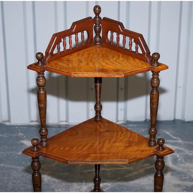 A delightful Victorian English Inlaid Burr Walnut Corner Whatnot Stand, rich in detail and period charm. Beautifully...