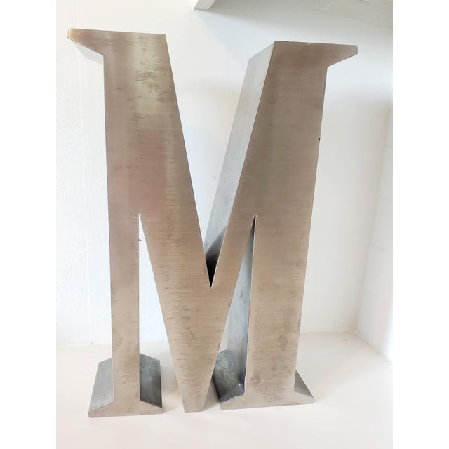 Large vintage metal & glass letter "M". All steel on front, top and sides. Glass on other side as seen in photo. Quite...