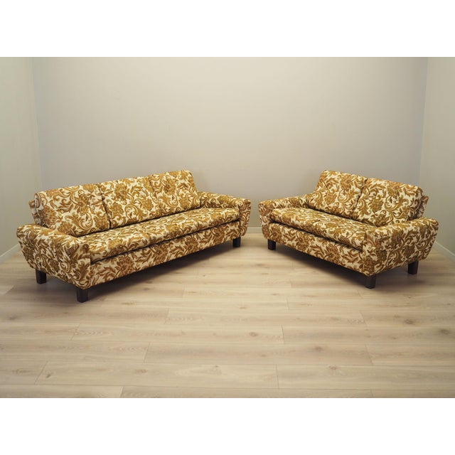 The sofa was made in the 1960s, Danish production. The legs of the furniture are made of plastic. Sofa preserved in...