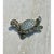 This vintage brooch is sculpted in the whimsical form of a sea turtle, captured mid-swim with its head extended forward...