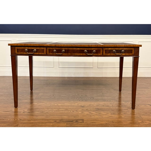 This is a Traditional Mahogany Hepplewhite Writing Desk by Leighton Hall. It is ideal for the home office, library or...