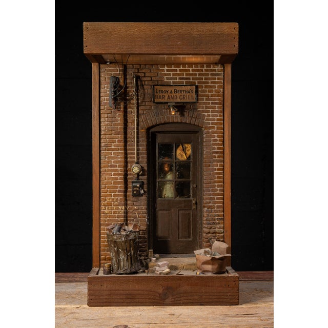 Handcrafted mixed-media illuminated diorama by Michael Garman from his celebrated Cityscape series, depicting the rear...