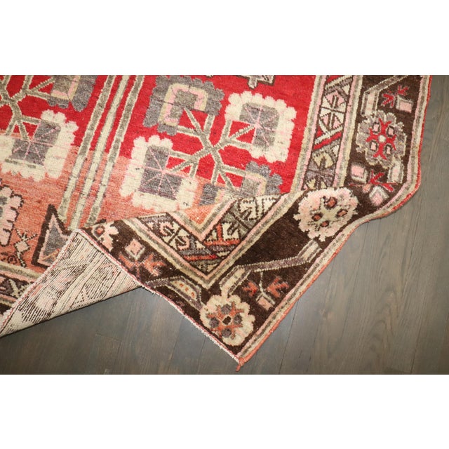 an early 20th-century Red Samarkand Khotan Rug Details rug no. j4368 size 4' 8" x 9' 3" (142 x 282 cm)