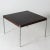 Neat rosewood side or small coffee table by Uno and Östen Kristiansson. Sleek, clean lines, with slender steel legs. The...