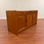 Vintage Danish teak sideboard offering lots of storage space in a clean, functional piece. Design cues include rounded...