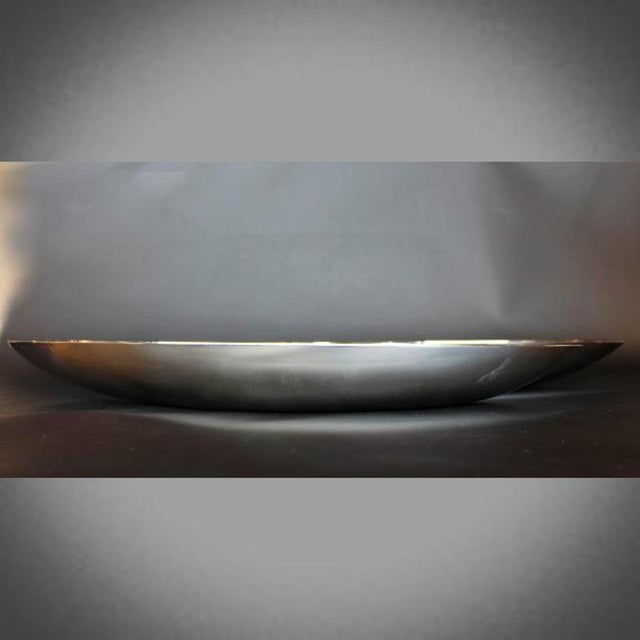 A pair of silver plated bread baskets designed by gio ponti for sabattini of italy. Stamped sabattini on underside....