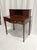 An exceptional Federal-style bow-front ladies' writing desk by Baker Furniture, crafted in the USA circa 1980s. This...