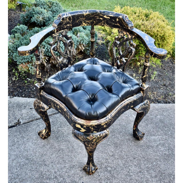 Vintage (1980's) Corner Chair has a Chippendale Style. Roundabout back, Ornate Black Lacquer Gilt Finish, and a Tufted...