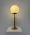 Rare Table Lamp by Hans-Agne Jakobsson model B93/A, 1960s. Brass stem with a round opaline glass shade. This piece has an...