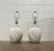 Beautiful matching pair of vintage white plaster table lamps with a swirling/scalloped pattern. They are wired for 3 way...