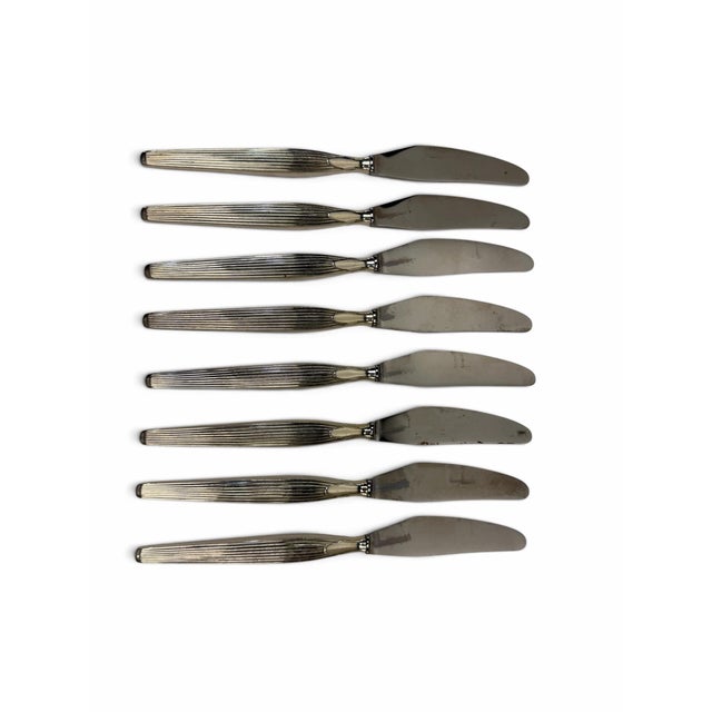Bring sleek Scandinavian sophistication to your table settings with this beautiful set of eight (8) vintage...