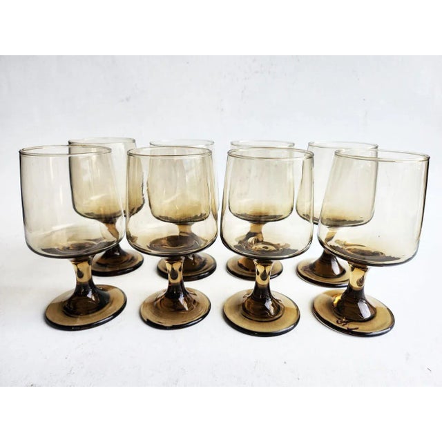 Offered is a set of 8 water or large wine goblets in Tawny Accent by Libbey Glass Company. The color on these goblets is a...