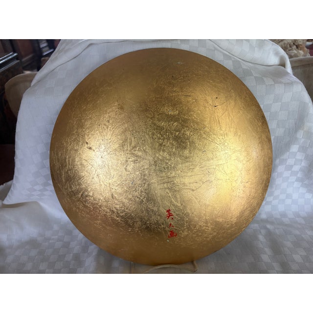 This Ukiyo print plate is intended for display. It depicts a traditional Geisha figure on a gold leaf back ground. It is...