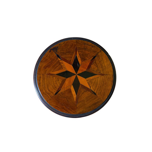 Victorian miniature tilt-top table. Sourced from England, this authentic piece was masterfully created as a cabinetmaker's...