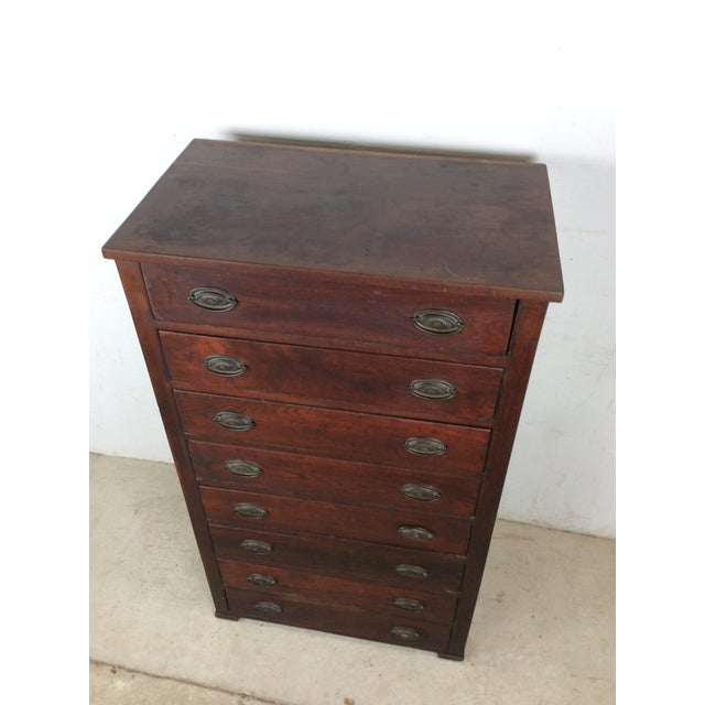 This mission style chest of drawers features hardwood construction, beautiful walnut finish, eight dovetailed drawers with...